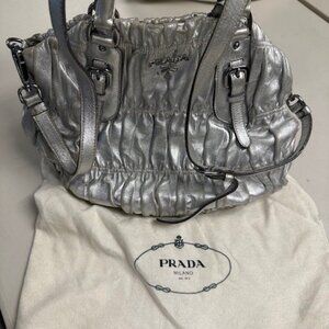 Prada Nappa Gaufre metallic silver leather messenger tote bag.